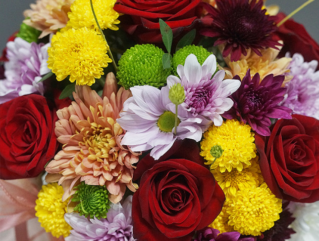 Arrangement with Red Roses and Chrysanthemum in a Pumpkin photo